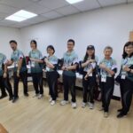 笑容跨越國界　世壯運羽球賽場上的志工溫暖感動人心